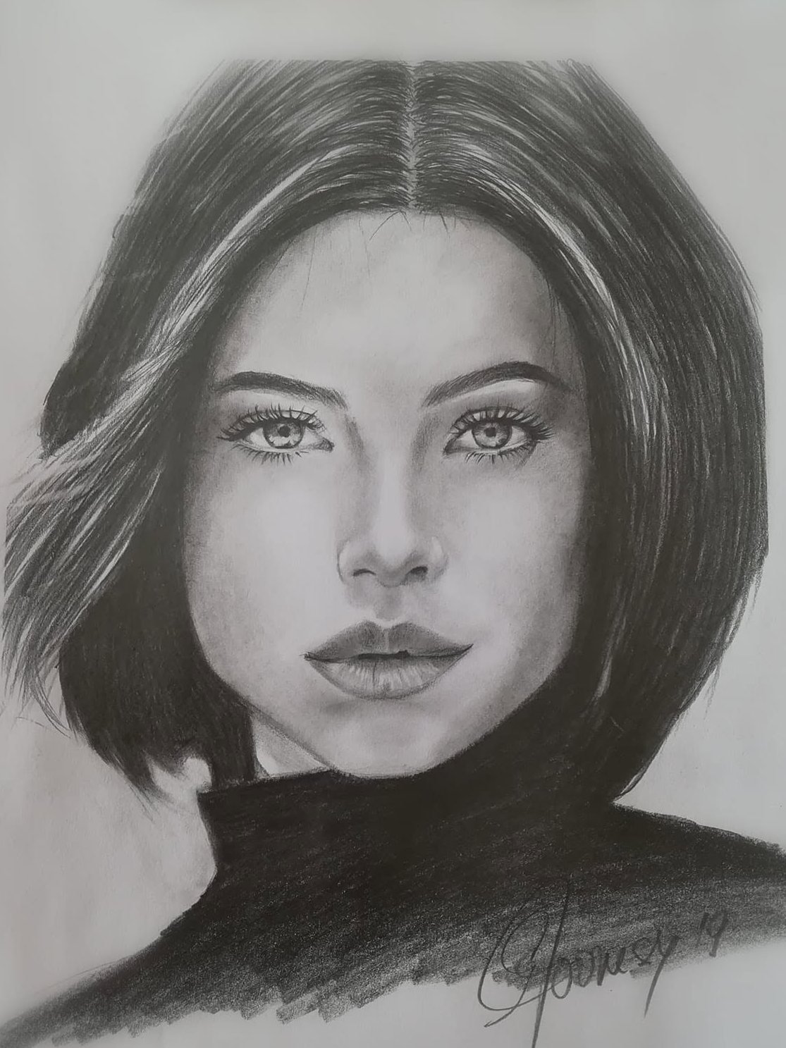 Graphite and charcoal portrait of a young woman with a bob